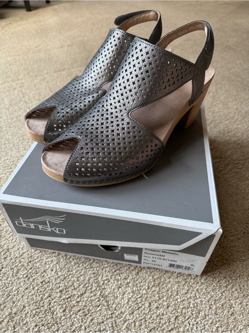 New in box size 42 Dansko Teagan gunmetal cutout heeled sandal.